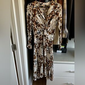 Gorgeous Free People, long sleeve dress. Button front and calf length.